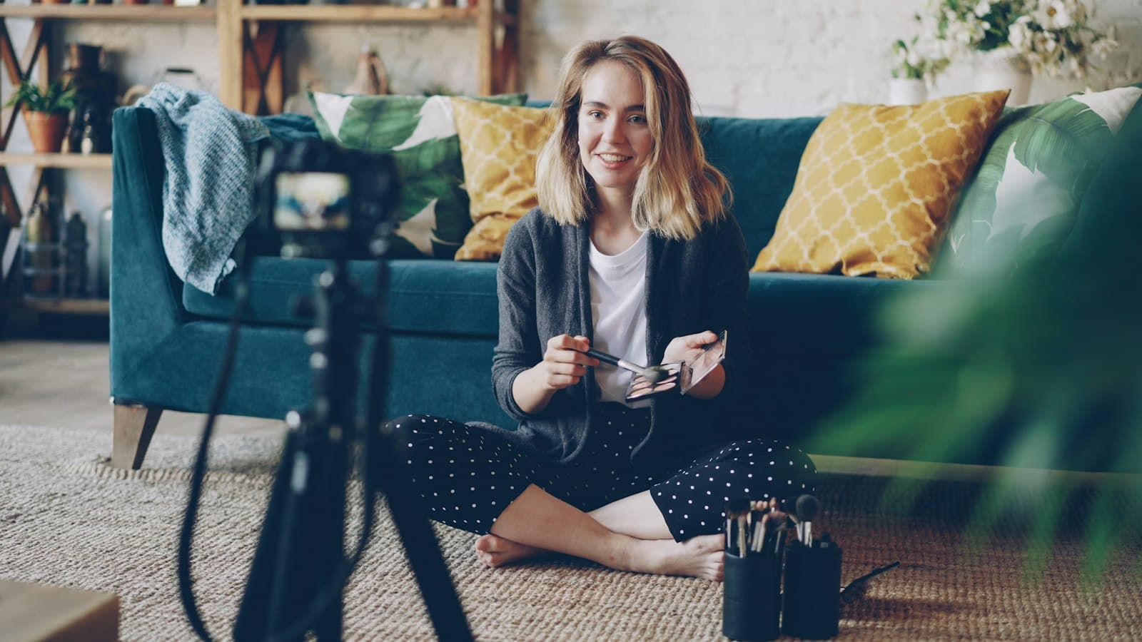 Creator filming a video at home
