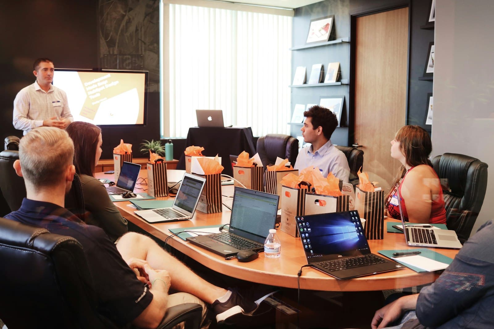 Business team in a meeting with laptops